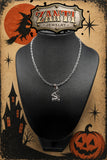 Halloween Witch on a Scooter necklace